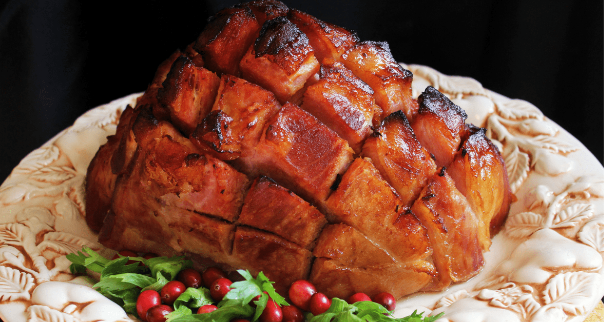 This baked ham is low carb and sugar free. It is glazed with a lite rosemary and "brown sugar" glaze. Great for any holiday table.
